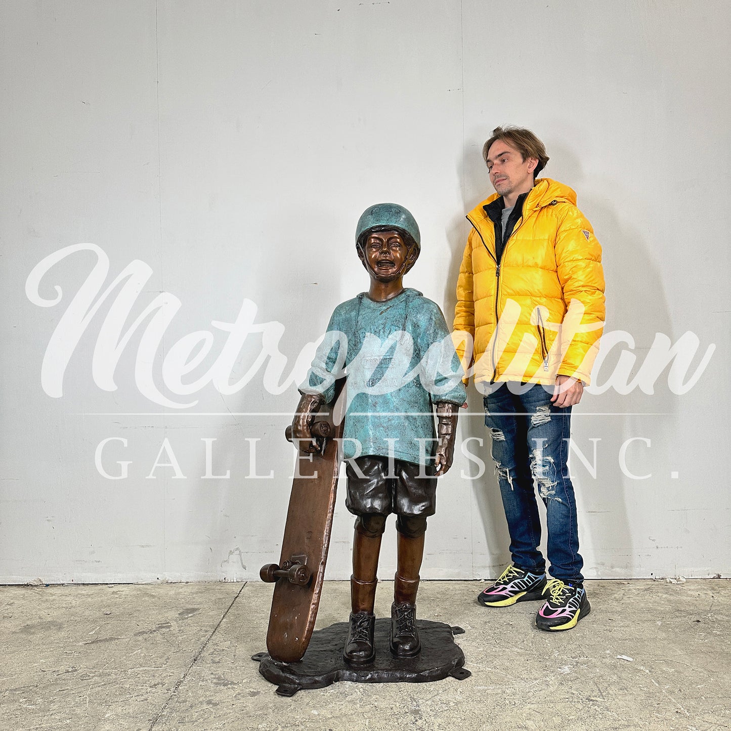 Boy with Skateboard Bronze Statue