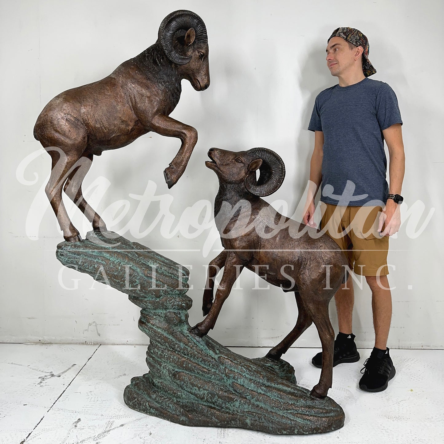 Two Rams on Rock Bronze Statue