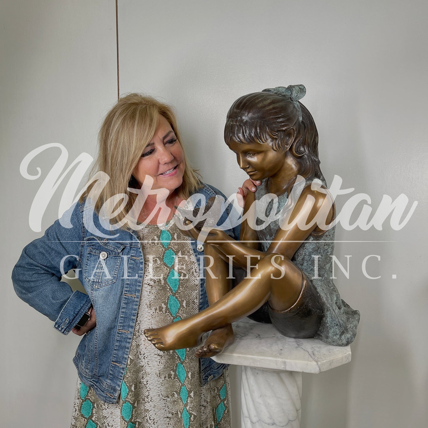 Sitting Girl holding Bird Bronze Statue