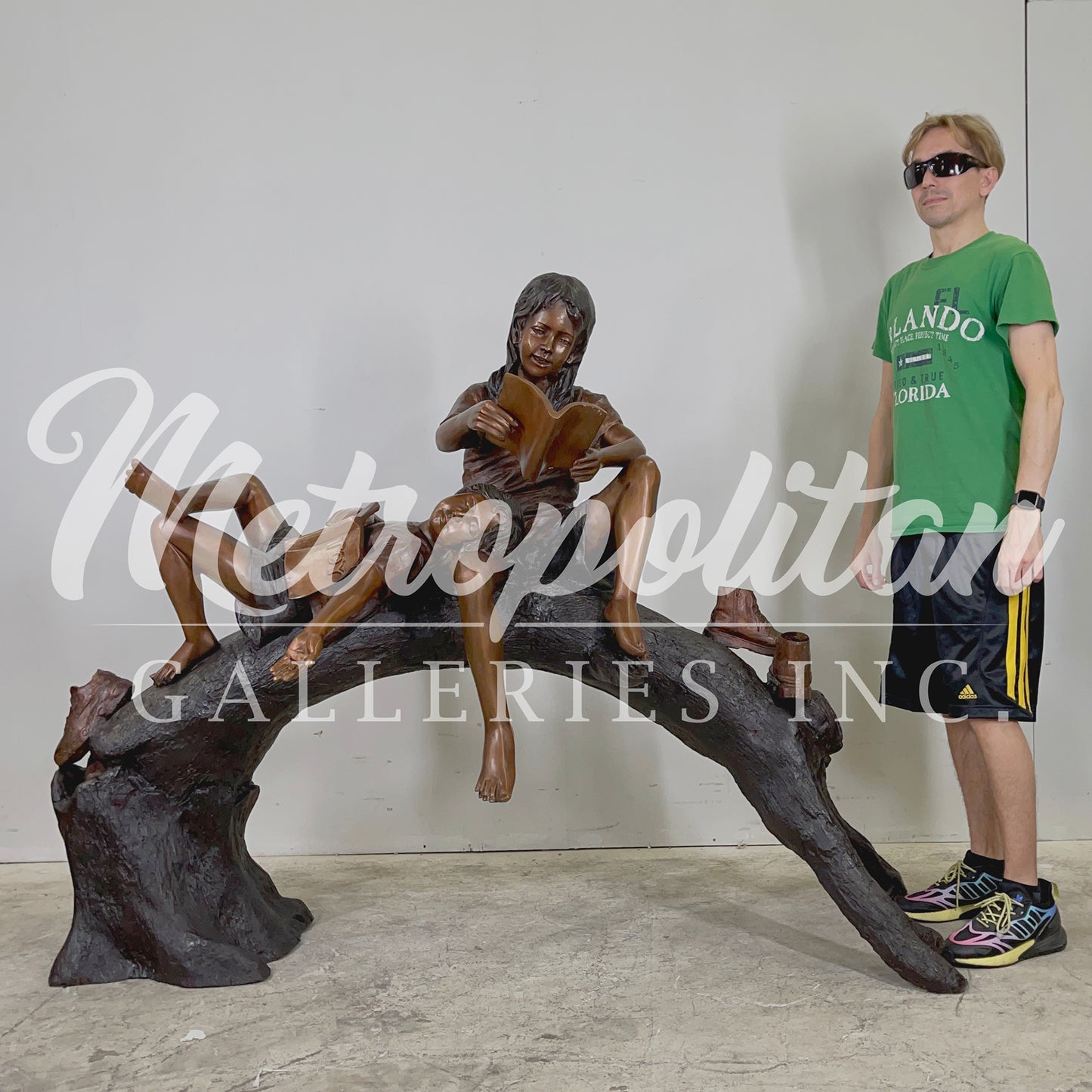 Children Reading on Log Bronze Statue