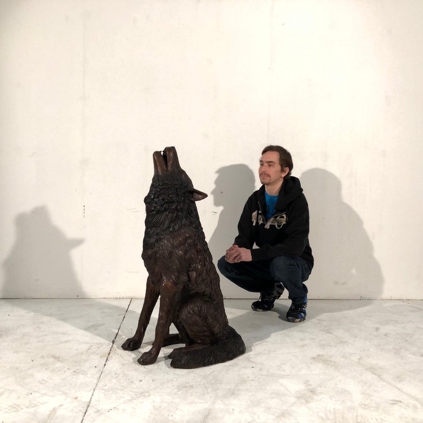 Sitting Howling Wolf Bronze Statue