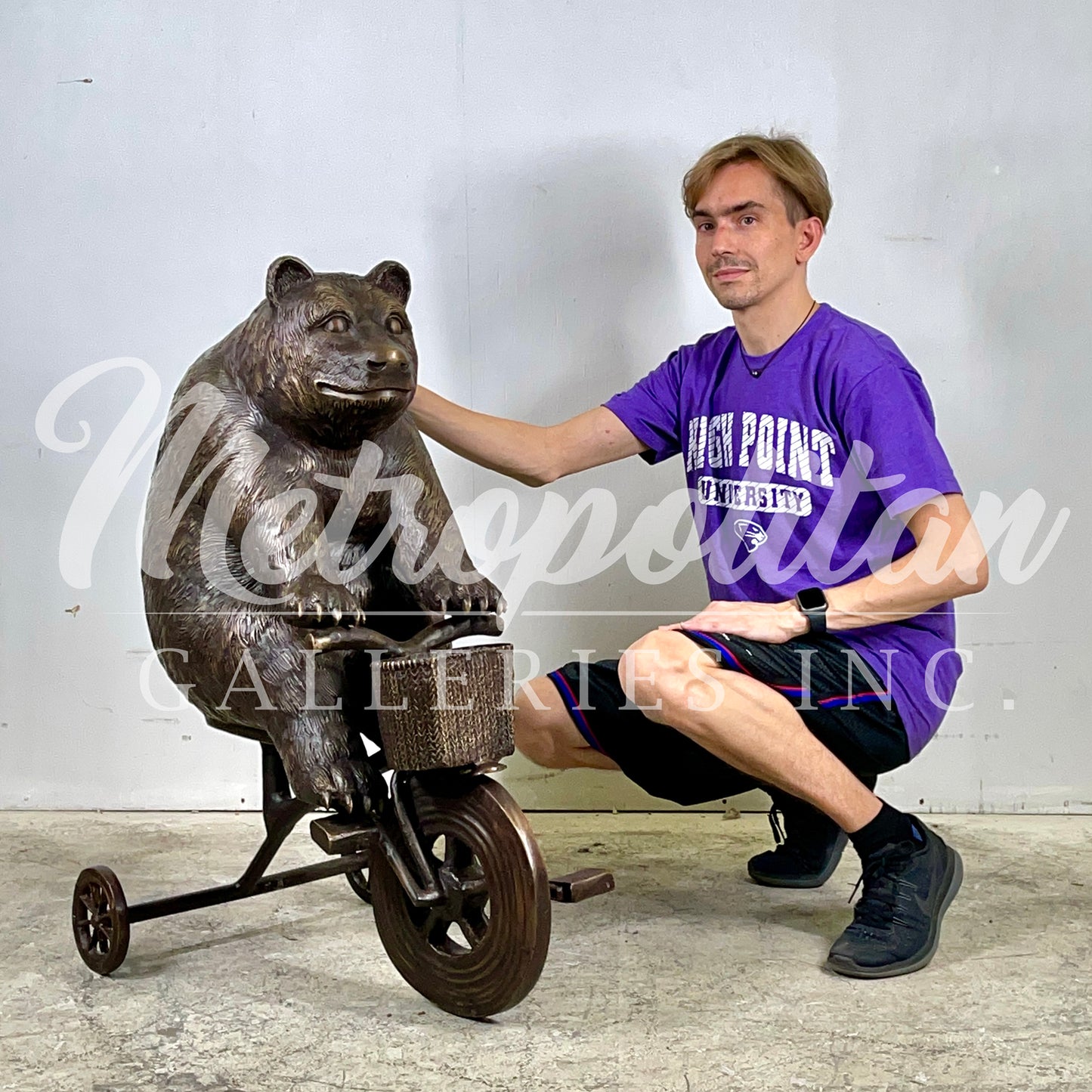 Bear riding Tricycle Bronze Statue