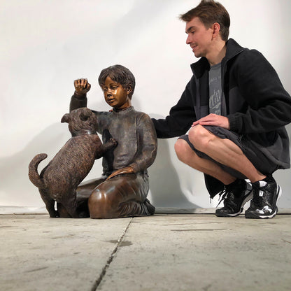 Boy Playing with Puppy Bronze Statue