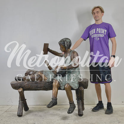 Boy & Girl Lounging on Bench Bronze Statue