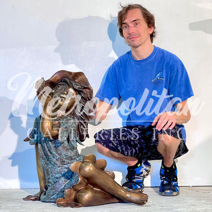 Sitting Girl holding Bird Bronze Statue